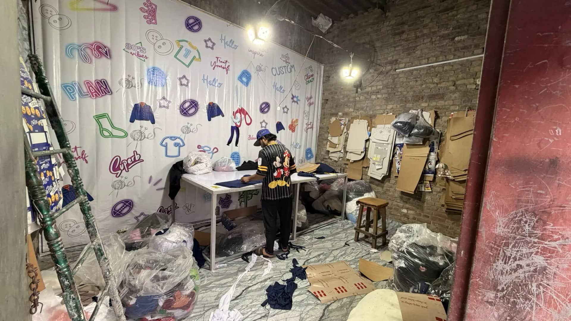 Custom decoration and screen-print wall inside Mughal Apparel factory