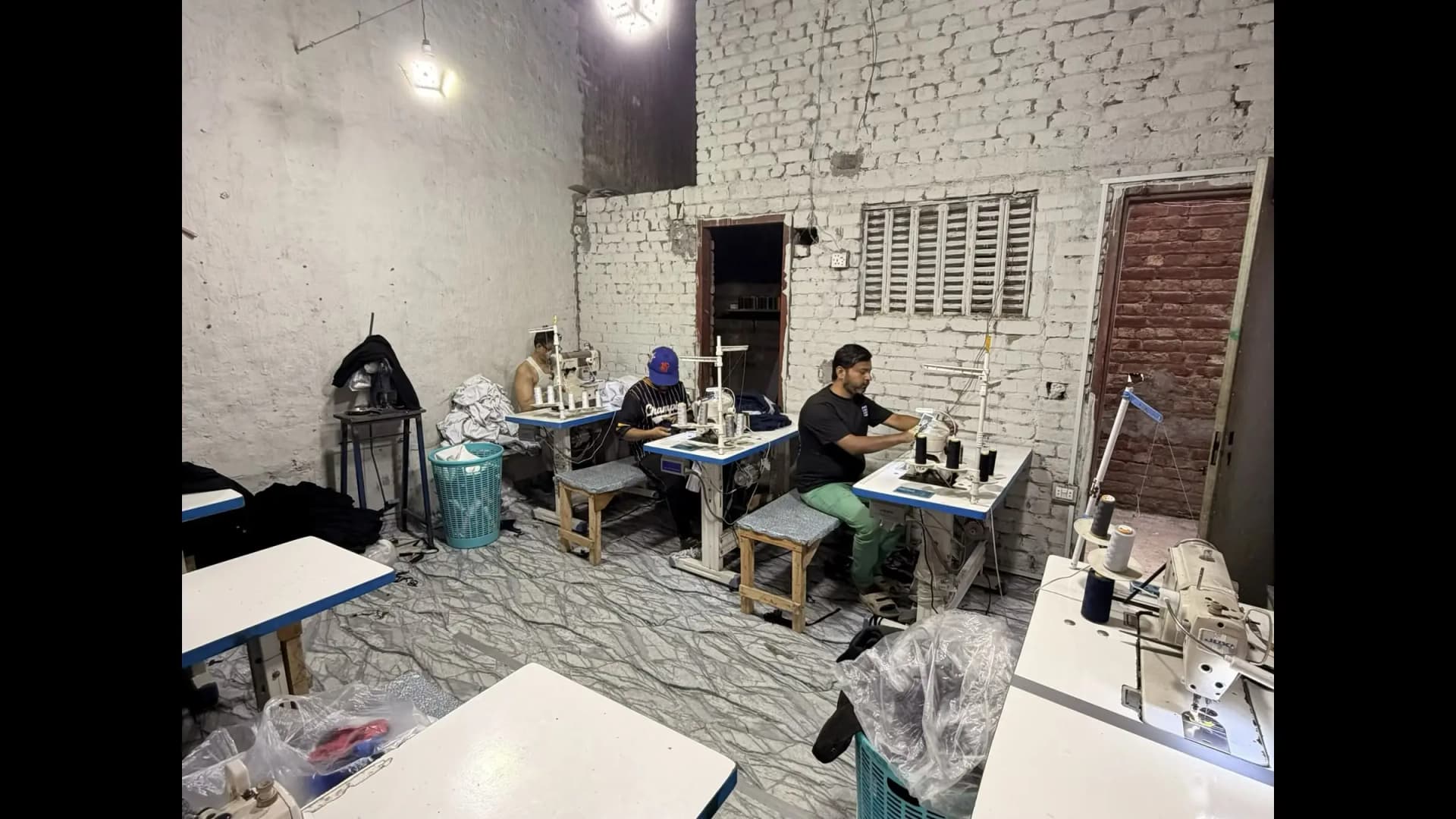 Industrial sewing operators at Mughal Apparel — Daska Sialkot Pakistan