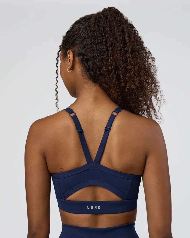 Momentum Twist Sports Bra - Vanilla Leopard — image 1 of 1